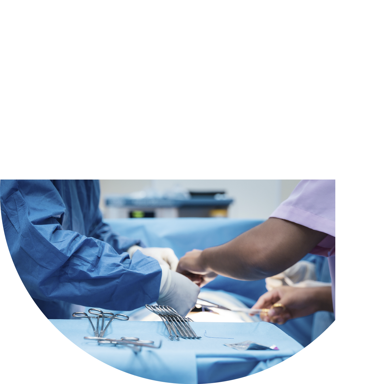 Doctor and nurse in the surgery room with a patient